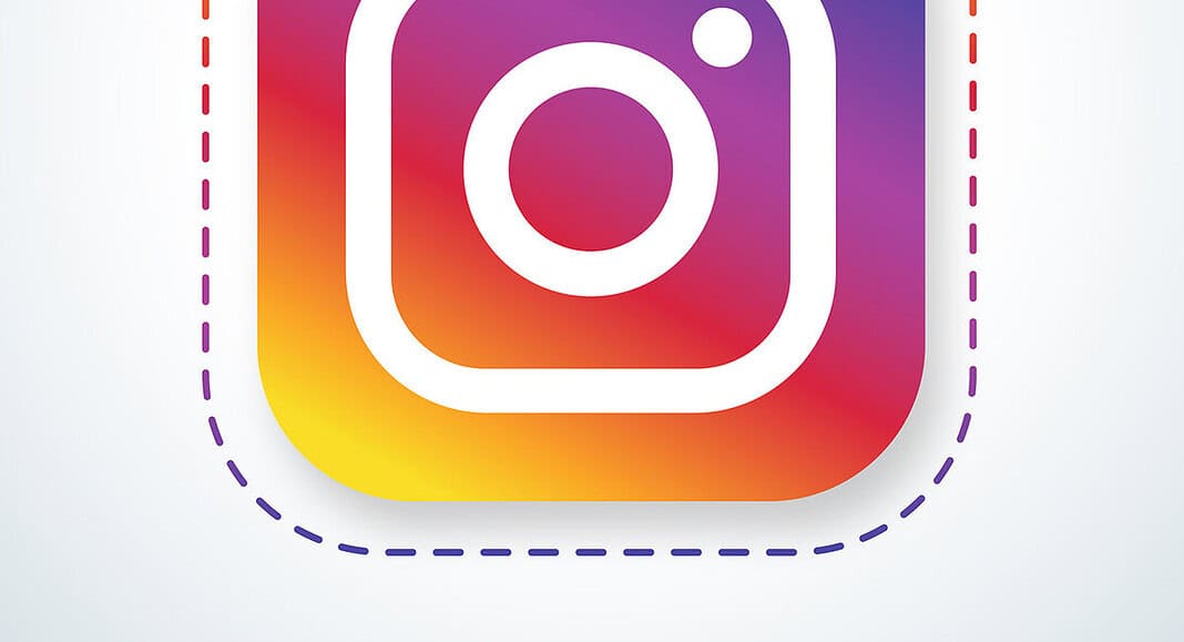 Il logo di Instagram si staglia con eleganza su uno sfondo sfumato e vivace, con la parola 