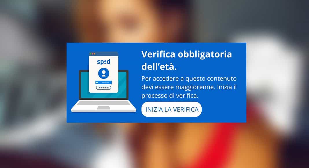 Un'icona del computer accompagna il messaggio di verifica dell'età. Il testo richiede agli utenti la conferma dell'età legale, integrando la verifica dell'età ed evidenziando SPID per un accesso sicuro, assicurando un processo di verifica affidabile su siti porno.